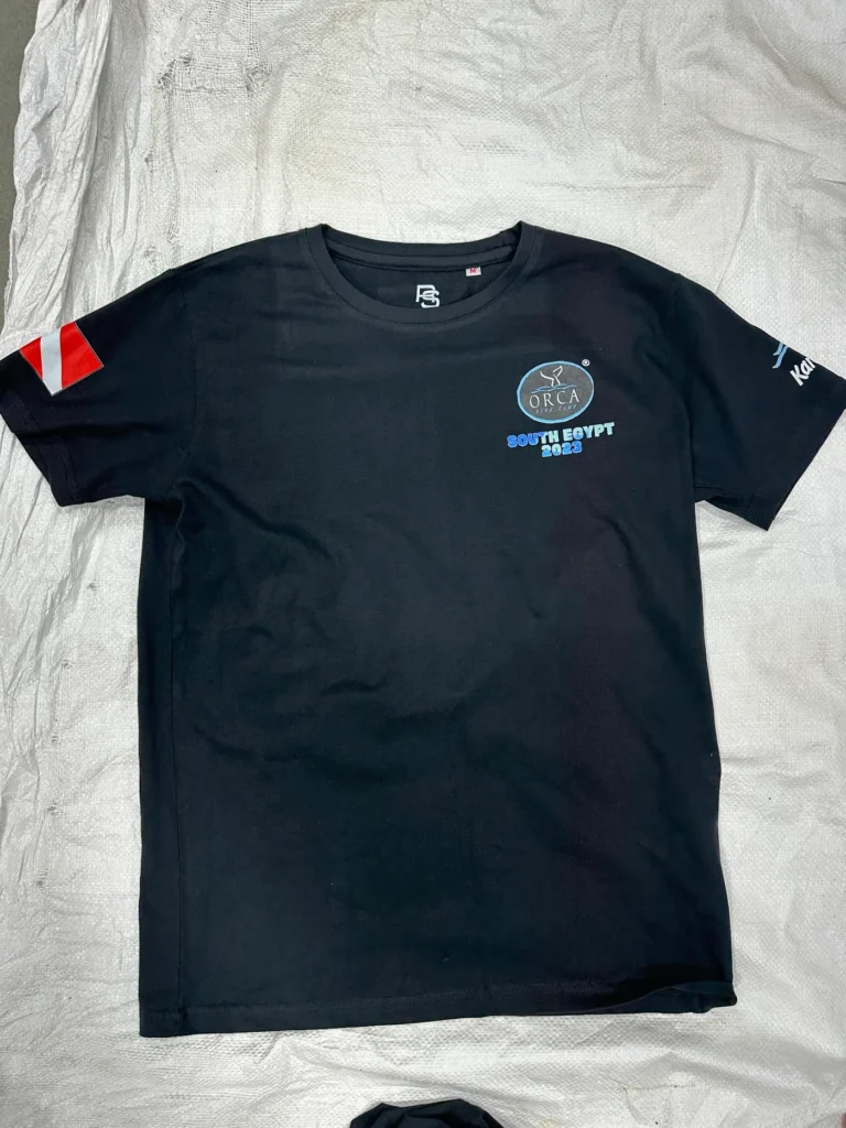 Black round-neck t-shirt with small chest print