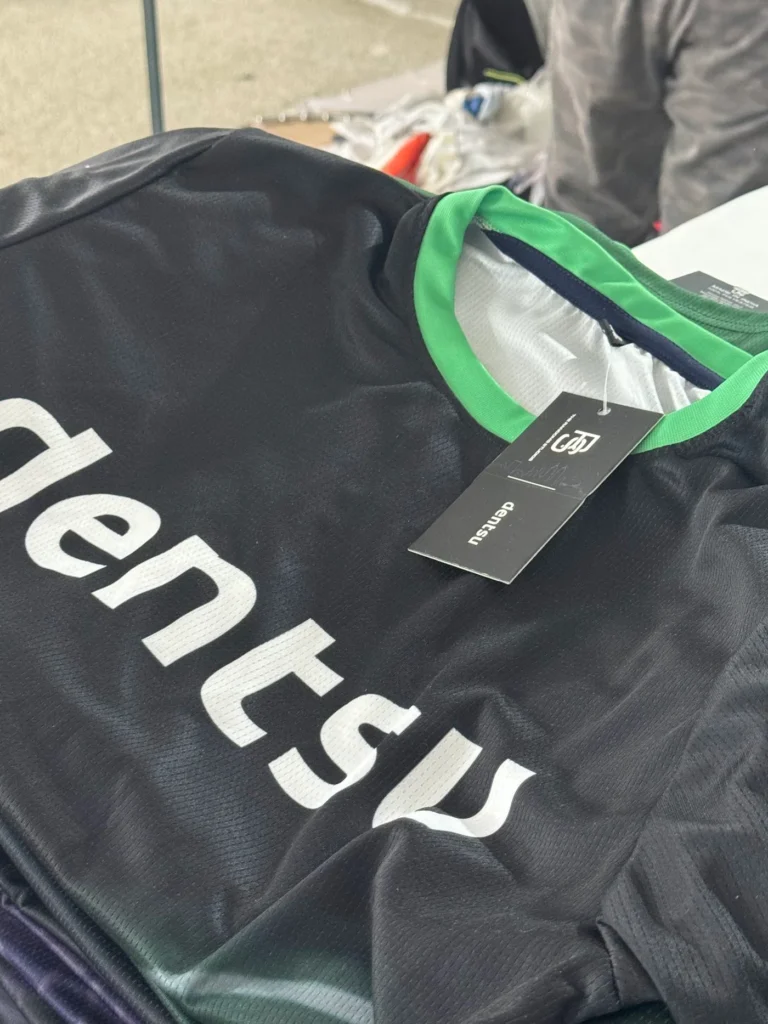 Black Dentsu round-neck t-shirt with print