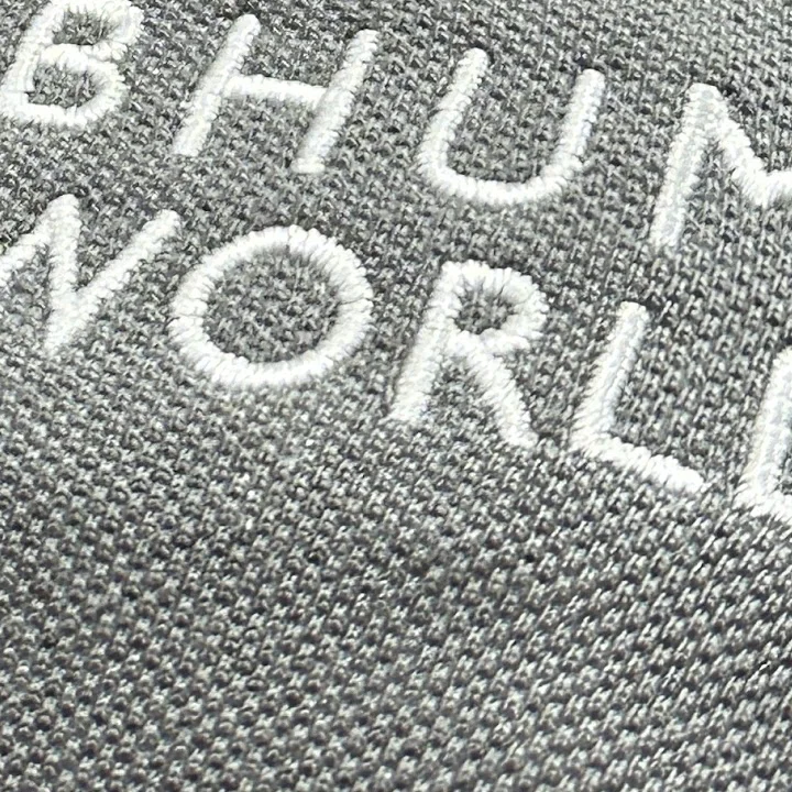 Close-up of satin-stitch embroidered lettering