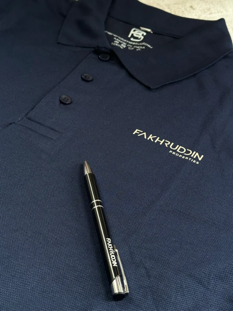 Navy polo with embroidered logo for Fakhruddin Properties