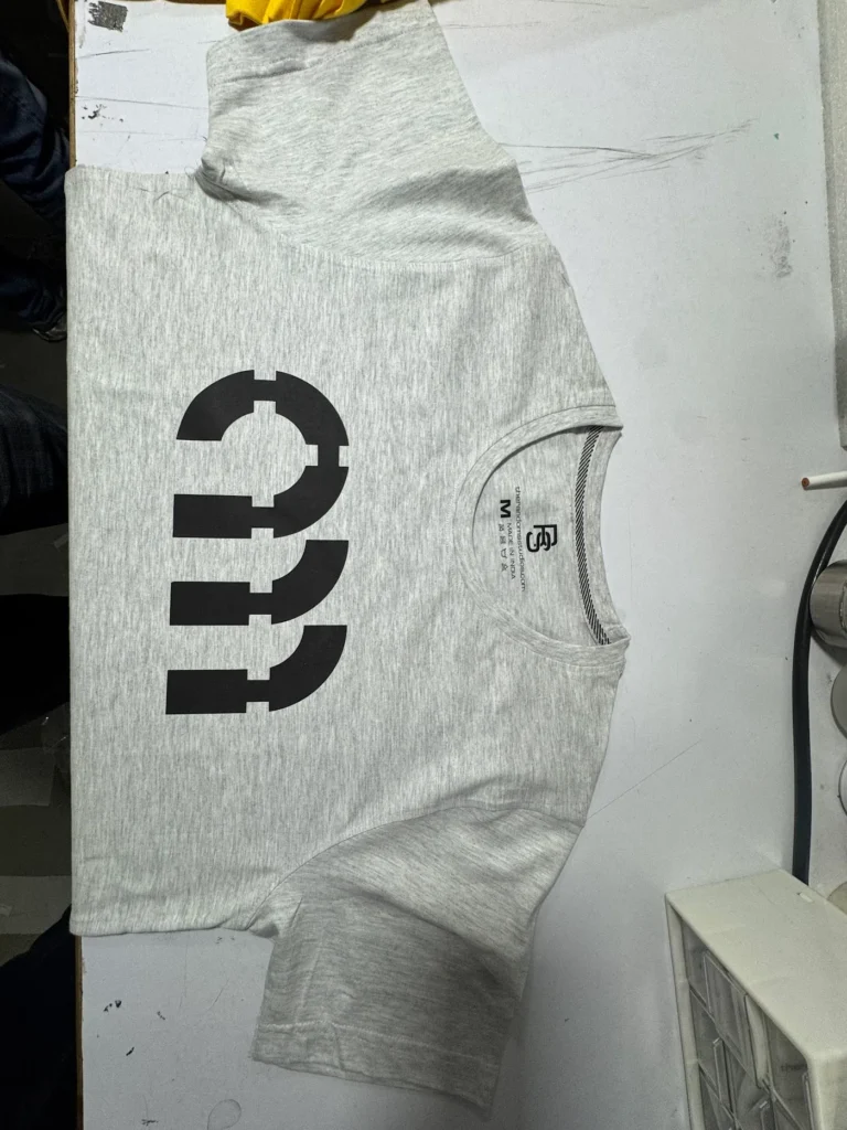 Grey t-shirt with bold black logo print for Armatrix