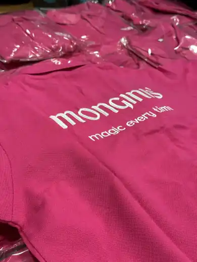 Pink Monginis polos with white embroidered logo