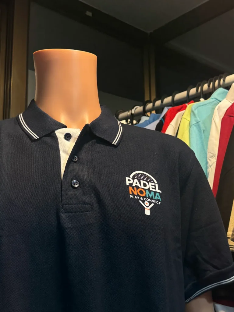 Navy polo with white tipping and chest logo