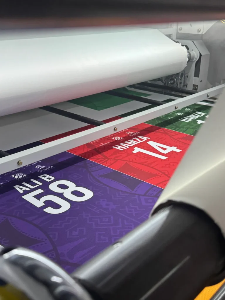 Player names and numbers being sublimation printed on jerseys